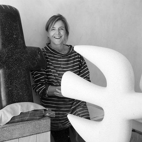 Photograph of Emma Maiden with her sculptures, 2017