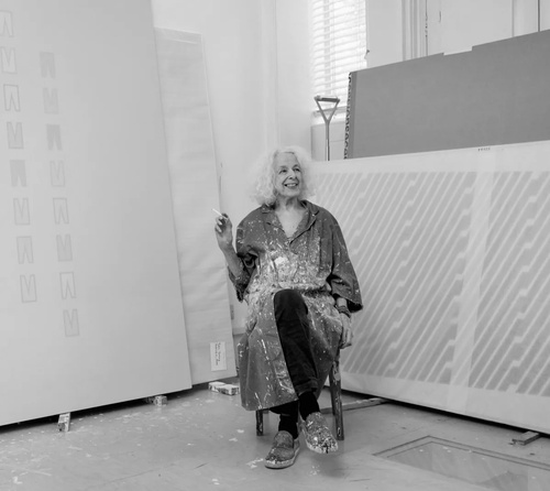 Photograph of Tess Jaray in her studio, 2024