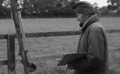 Photograph of Patrick George painting outdoors, 2013