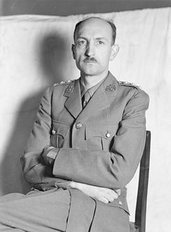 Photograph of Anthony Gross as an Official War Artist, circa 1941