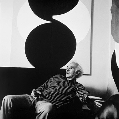 Photograph of Terry Frost with his painting