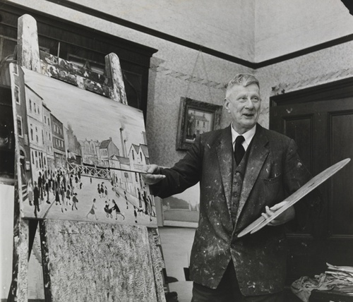 Photograph of Laurence Stephen Lowry in his studio, 1961