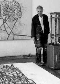 Photograph of Tony Bevan in his studio, date unknown