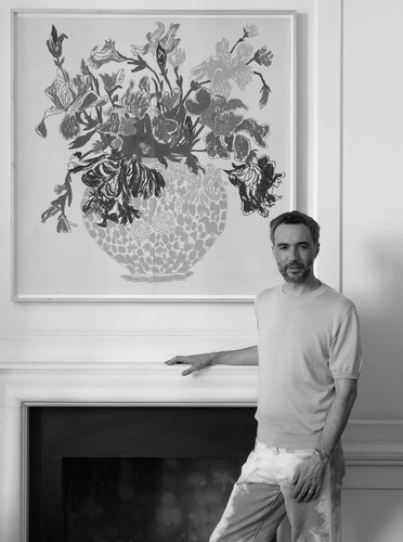 Photograph of Oisin Byrne with his work