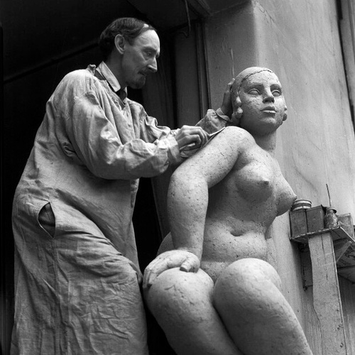 Photograph of Frank Dobson sculpting, 1929