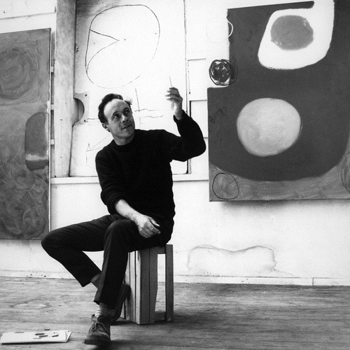 Photograph of Patrick Heron with his paintings taken by J.S. Lewinski, 1964