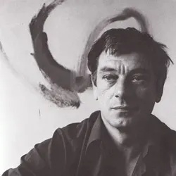 Photograph of Brian Fielding in front of his work