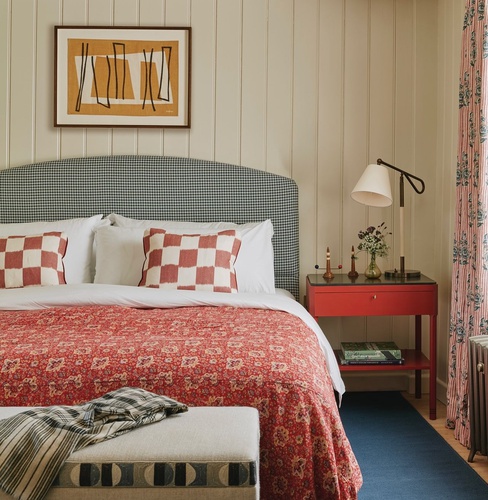 Susie Atkinson interior - bedroom featuring print by Stanley Dorfman