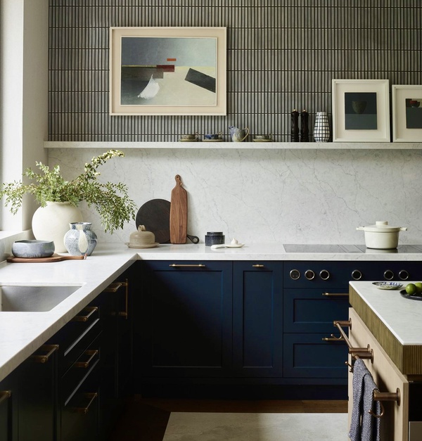 Homes and Garden interior, kitchen featuring painting by Keith Purser