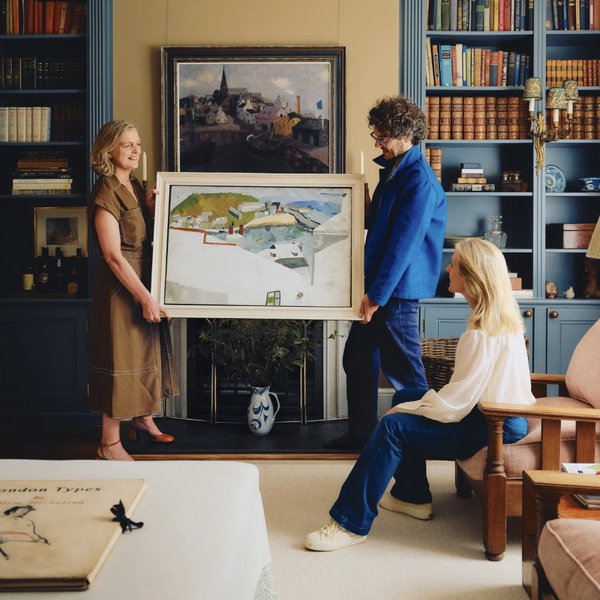 Jenna Burlingham team deciding where to hang Kate Nicholson painting